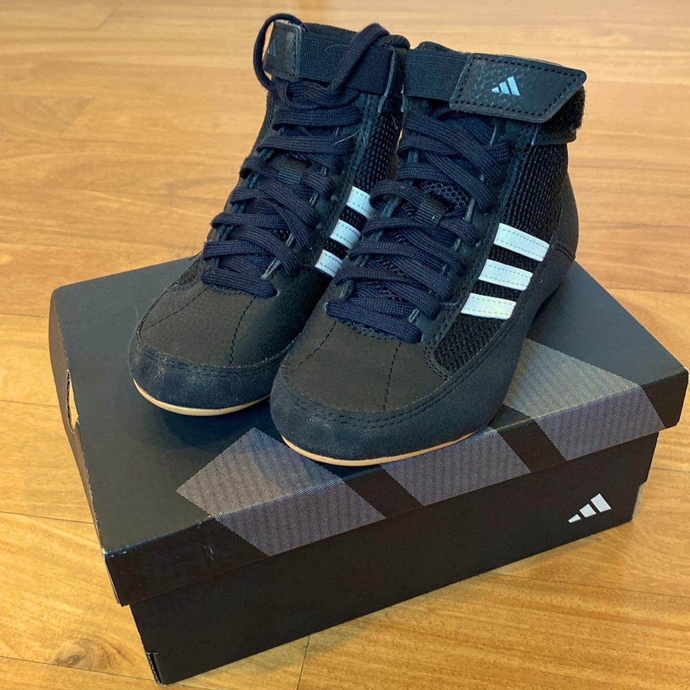 My son tried wrestling but doesn’t like… these shoes have been worn twice